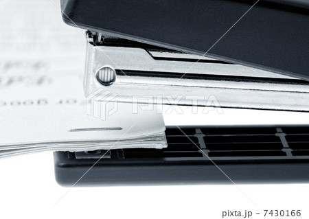 Stapler attach a documents. Isolated on a white. 7430166
