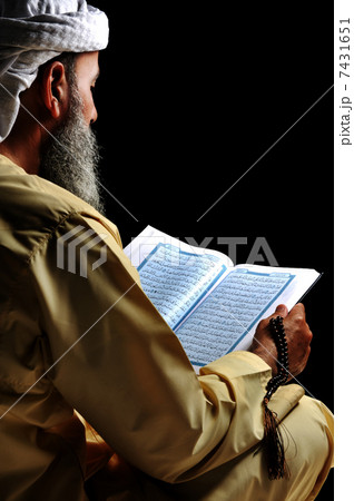 Muslim reading Koran Muslim reading Koran 7431651