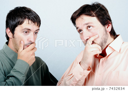 Two worried man 7432634