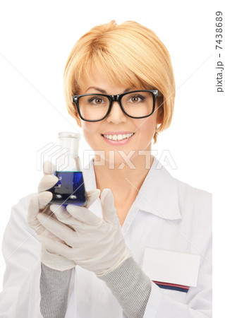 lab worker holding up test tube 7438689