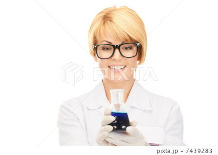 lab worker holding up test tube 7439283
