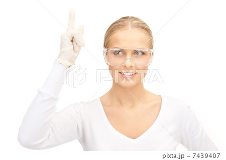 woman in protective glasses and gloves woman in protective glasses and gloves 7439407