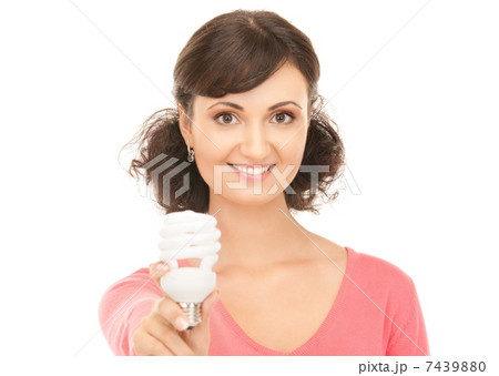 woman holding energy saving bulb 7439880
