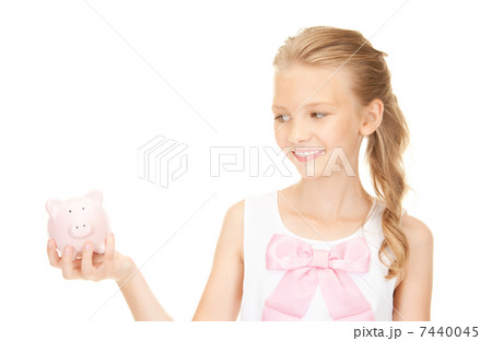 lovely teenage girl with piggy bank lovely teenage girl with piggy bank 7440045