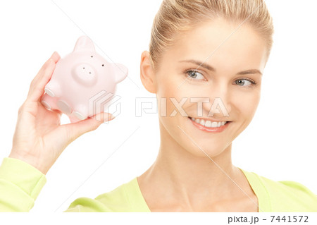 woman with piggy bank woman with piggy bank 7441572