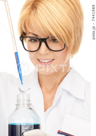lab worker holding up test tube 7441989