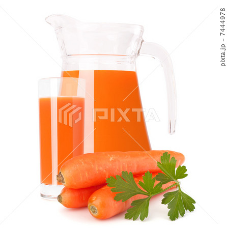 Carrot vegetable juice in glass jug 7444978