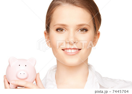 lovely woman with piggy bank 7445704