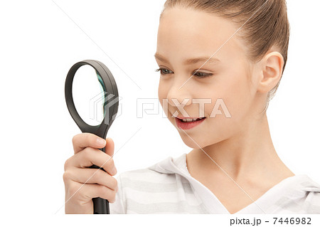 teenage girl with magnifying glass 7446982