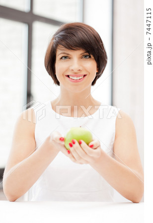 lovely housewife with green apple lovely housewife with green apple 7447115