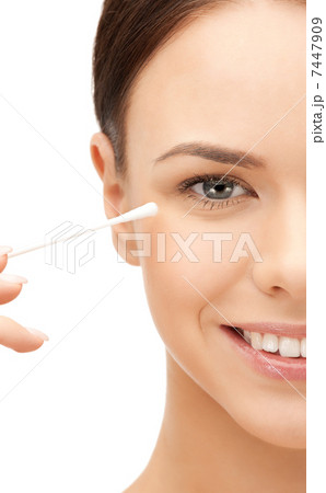 beautiful woman with cotton bud beautiful woman with cotton bud 7447909