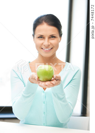lovely housewife with green apple lovely housewife with green apple 7448172