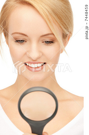 woman with magnifying glass woman with magnifying glass 7448459