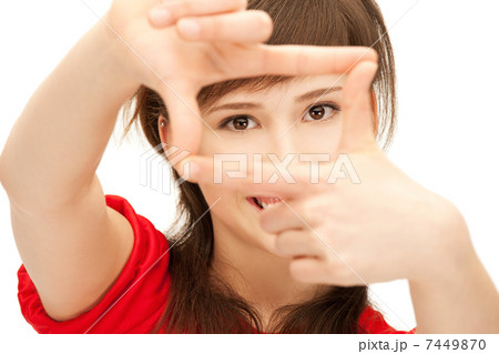 teenage girl creating a frame with fingers 7449870