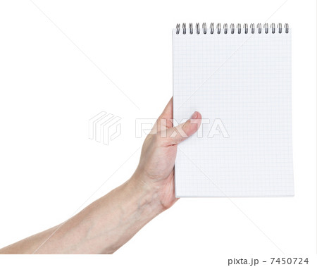 adult man hand holding notebook on a spring adult man hand holding notebook on a spring 7450724
