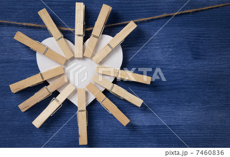 many clothespins on paper heart 7460836