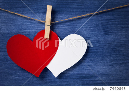 Two paper hearts hanging on a rope Two paper hearts hanging on a rope 7460843