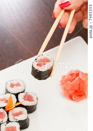 sushi with chopsticks 7465353