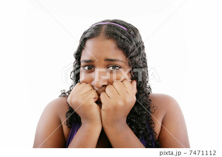 A young frightened black woman, isolated on white 7471112