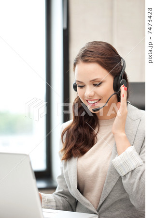 helpline operator with laptop computer 7473428