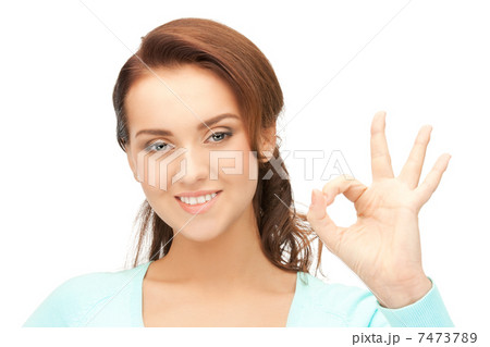 lovely teenage girl showing ok sign lovely teenage girl showing ok sign 7473789