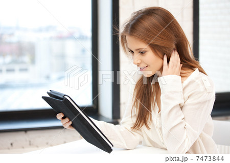 happy woman with tablet pc computer 7473844