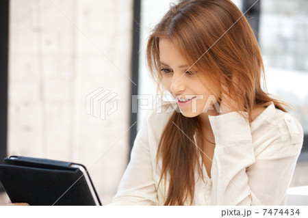 happy woman with tablet pc computer 7474434