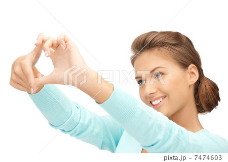 lovely woman creating a frame with fingers 7474603