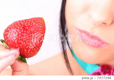 Lips and ripe strawberry 7477298