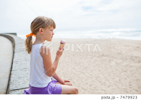 Girl with ice cream near beach Girl with ice cream near beach 7479923