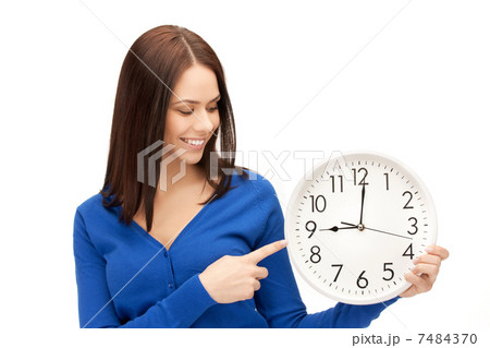 woman holding big clock 7484370