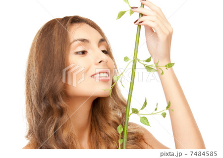 woman with green sprout 7484585