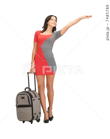 hitch-hiking woman with suitcase 7485789