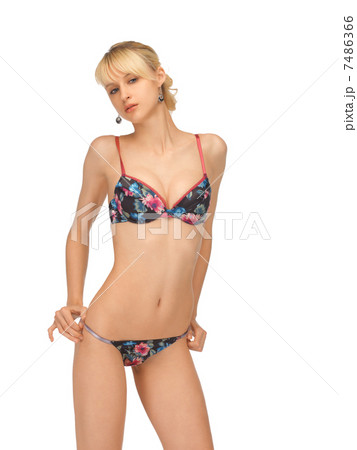 undressing woman in sexy lingerie undressing woman in sexy lingerie 7486366