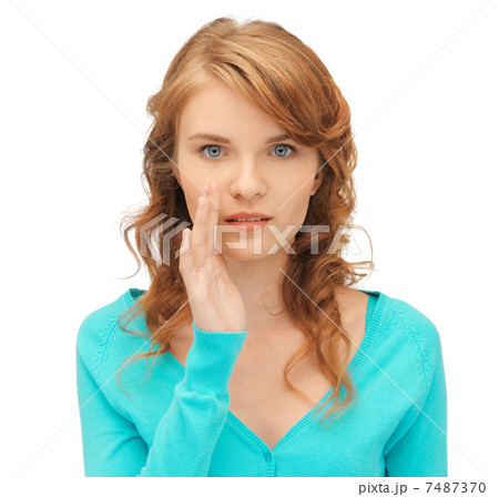 teenage girl whispering gossip 7487370