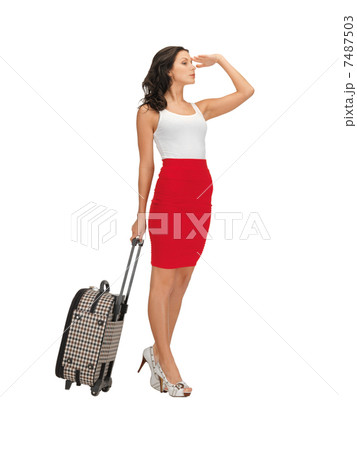 pensive woman with suitcase pensive woman with suitcase 7487503