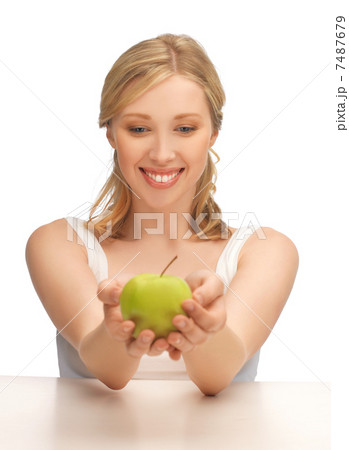 woman with green apple woman with green apple 7487679