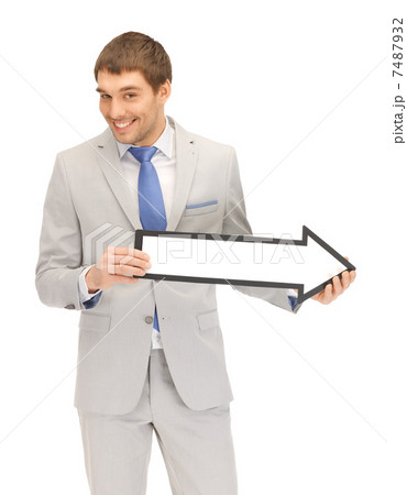 businessman with direction arrow sign businessman with direction arrow sign 7487932