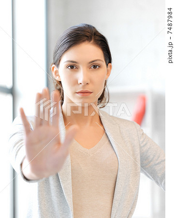 woman making stop gesture 7487984