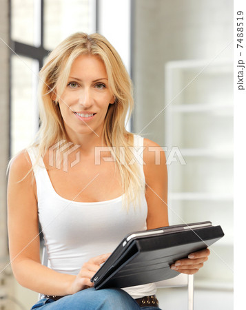 happy woman with tablet pc computer 7488519