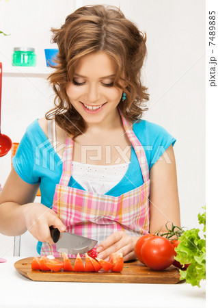 beautiful woman in the kitchen beautiful woman in the kitchen 7489885