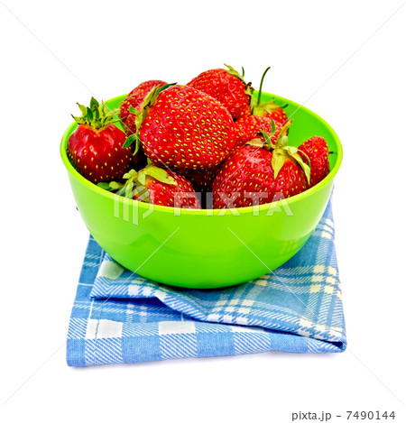 Strawberries in a green bowl with a napkin Strawberries in a green bowl with a napkin 7490144