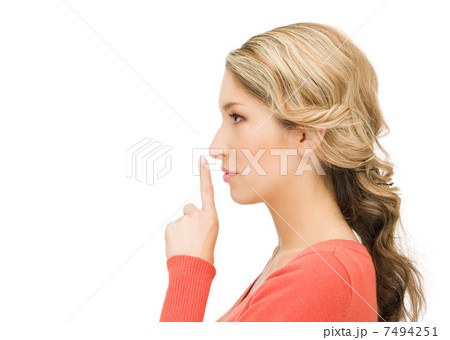 picture of woman with finger on lips 7494251