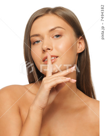 woman with finger on lips 7494382