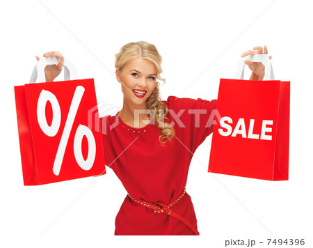 beautiful woman in red dress with shopping bag beautiful woman in red dress with shopping bag 7494396