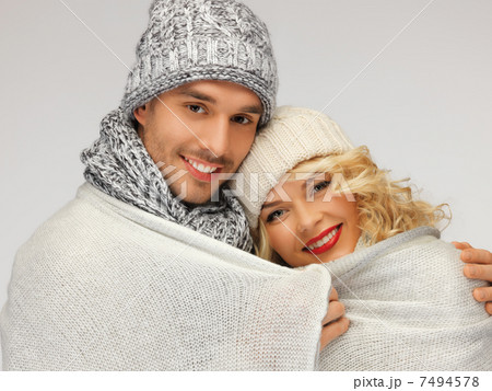 family couple under warm blanket family couple under warm blanket 7494578