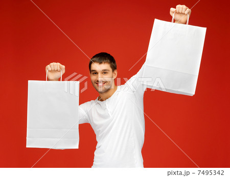 man with shopping bags 7495342