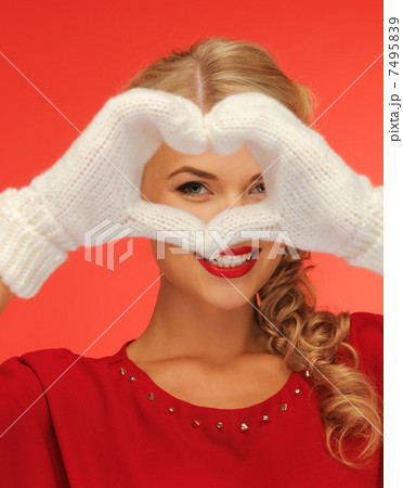 lovely woman showing heart shape 7495839