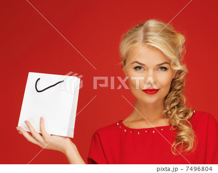lovely woman in red dress with shopping bag lovely woman in red dress with shopping bag 7496804