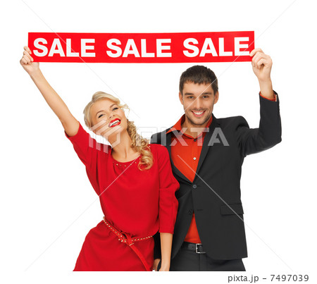 man and woman with sale sign 7497039